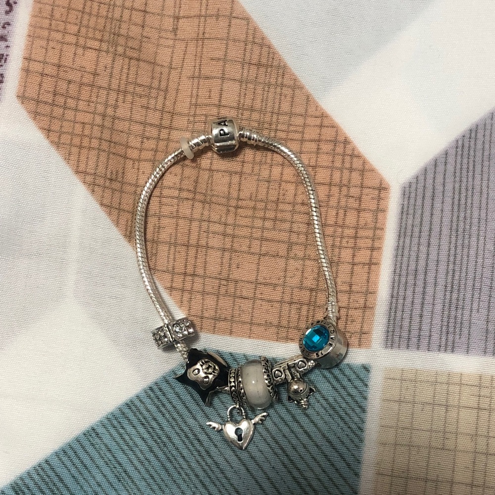 Chic Silver Charm Bracelet with Heart and Blue Accent